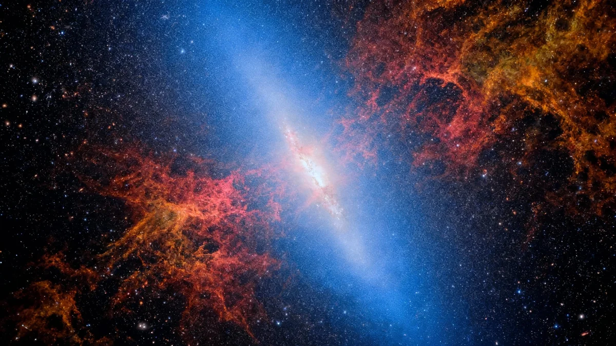Webb Telescope Reveals Fiery Heart of Cigar Galaxy